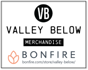 Button that links to online merchandise store; valley below logo above text that reads: Valley Below Merchandise; Bonfire; bonfire.com/store/valley-below